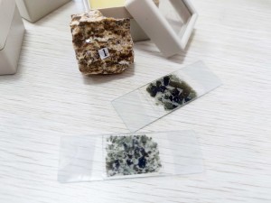 Microscope slides prepared by grinding mineral slides for teaching experiments